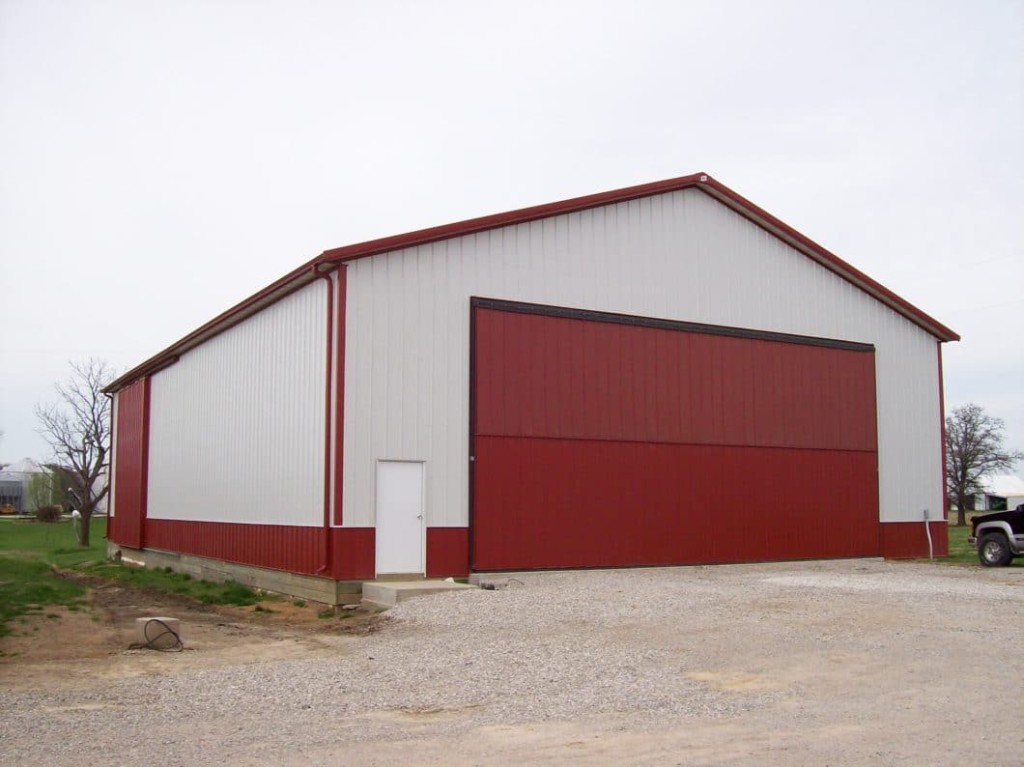 Bi-Fold Door Post-frame building with a large bi-fold door for wide equipment access.