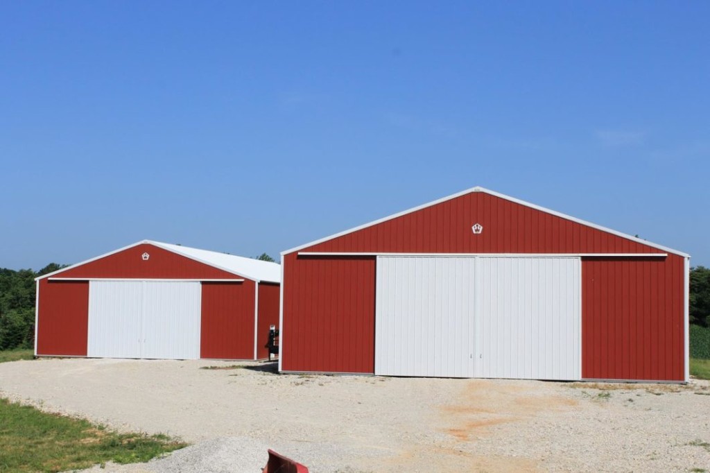 Dual Sliding Doors Post-frame pole barn with dual sliding doors for wide equipment access.