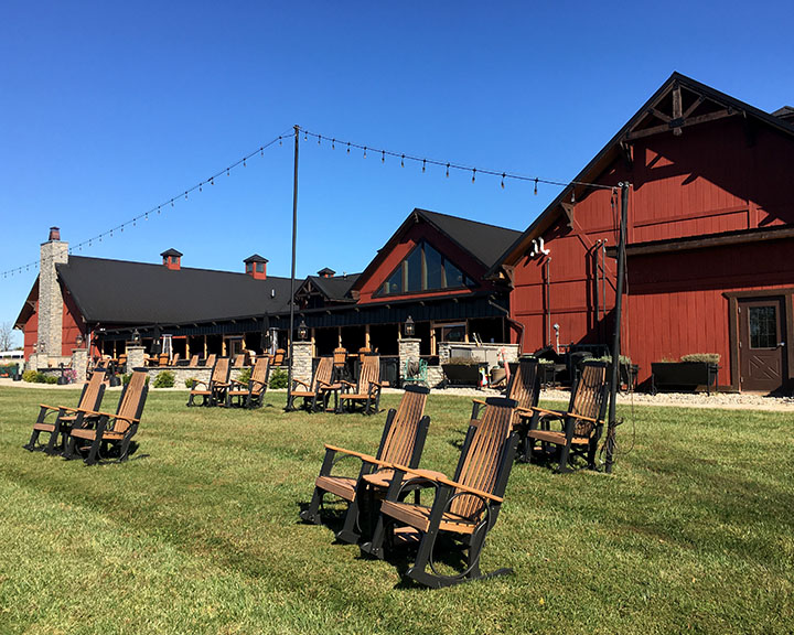 Commercial winery with outdoor seating area, patio space, and steel building with rustic design