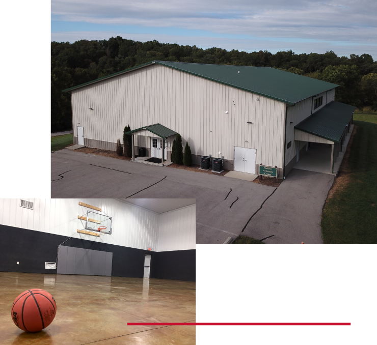 Post frame recreation building with steel siding and gymnasium interior featuring basketball court and open-span layout