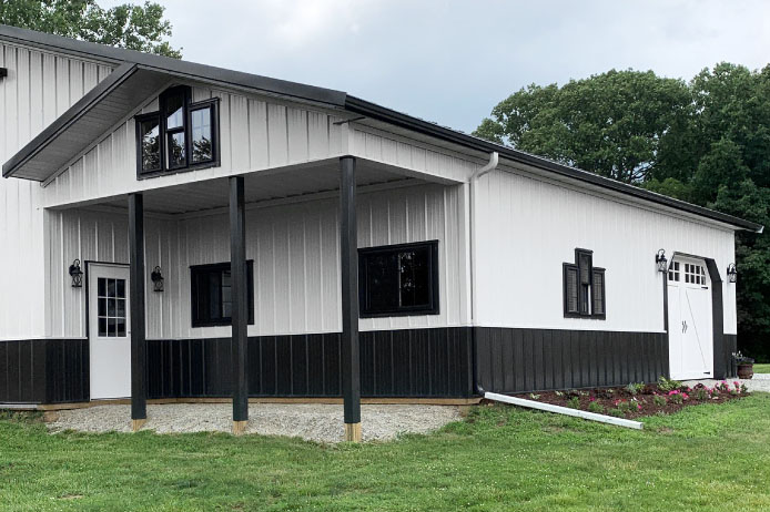 Equipment Storage Building with Covered Porch Entry | Walters Buildings Equipment storage building with covered porch, entry door, and windows