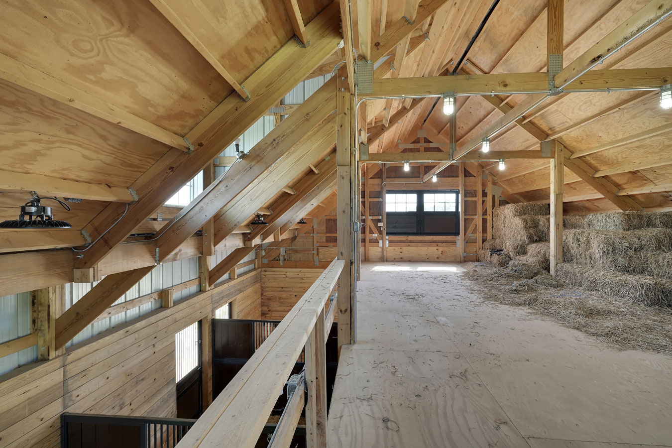 Horse barn loft hay storage above horse stalls