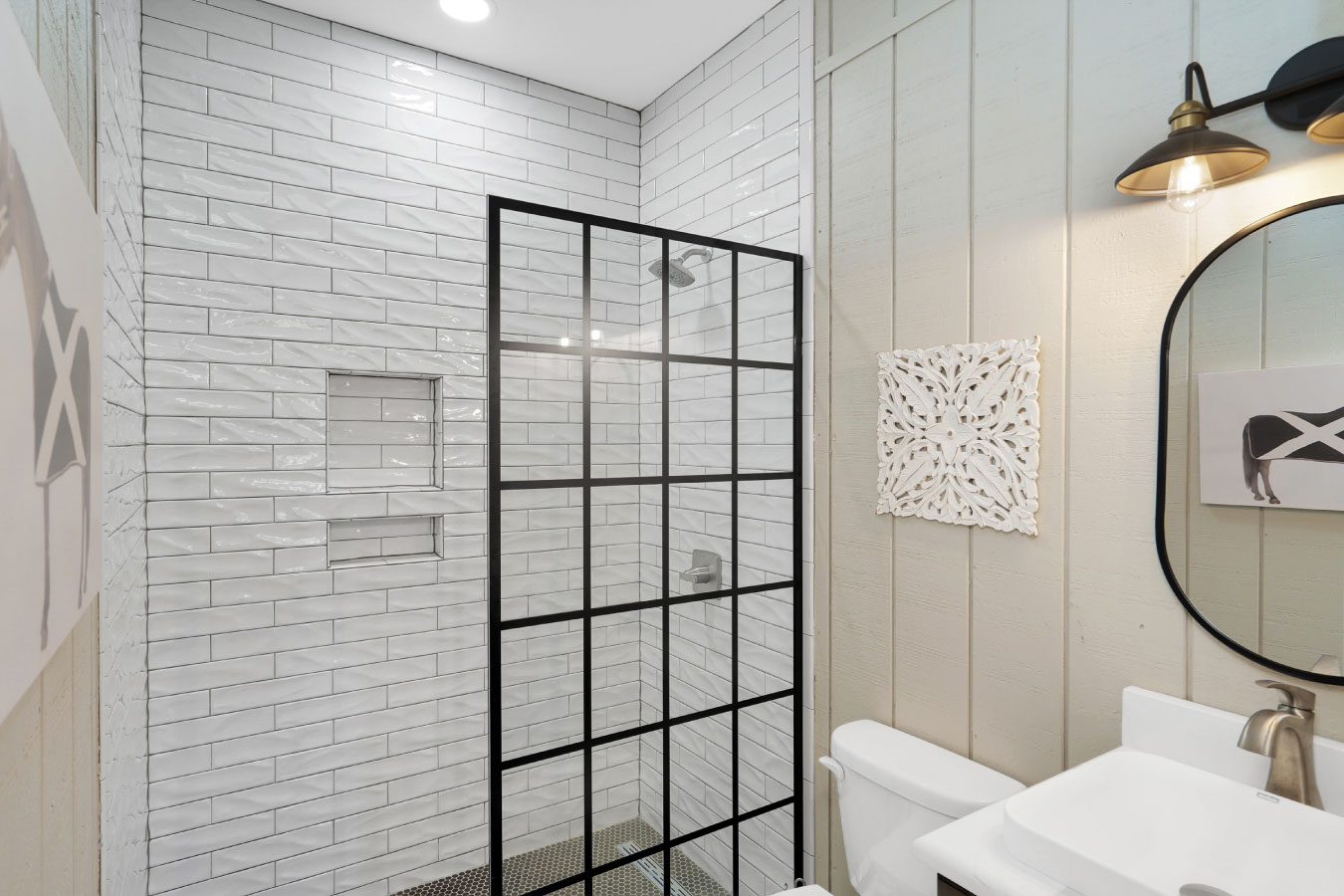 Horse barn living quarters bathroom with tiled walk-in shower