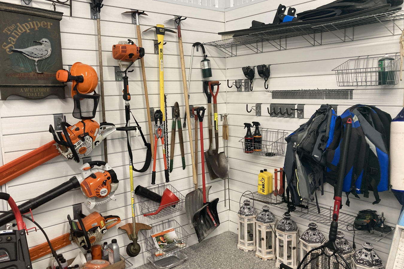 Shop with living quarters workshop wall storage system with tools and organized equipment