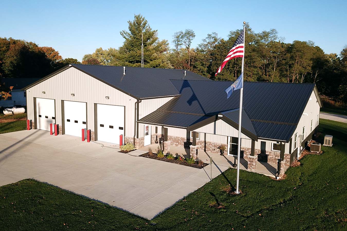 Bagdad Fire Department post frame building with four apparatus bay doors Aerial View of Front Entrance