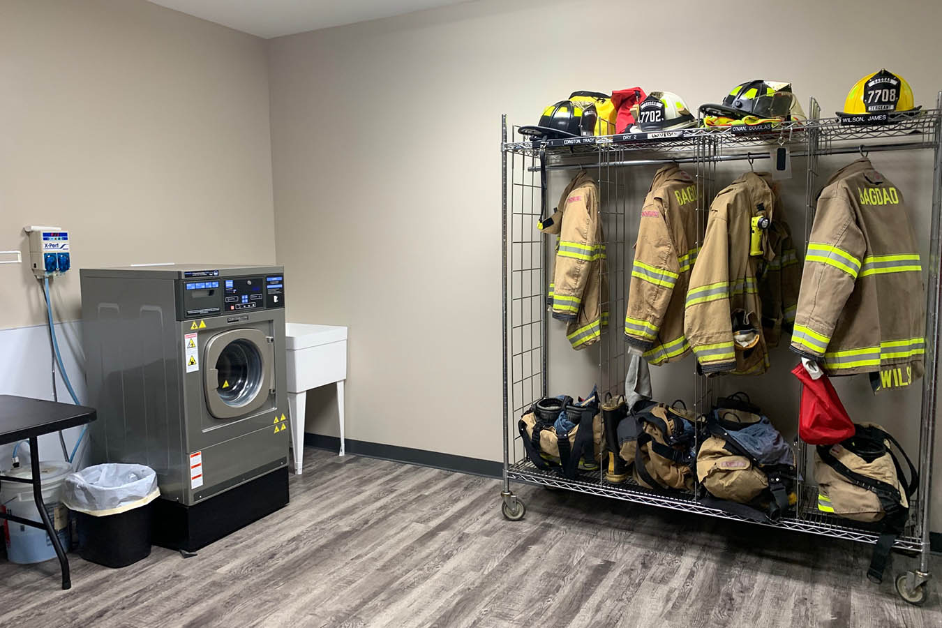 Firefighter gear storage and laundry room in a fire department station
