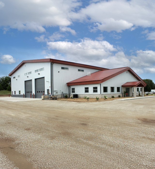 Large Industrial Metal Building – Commercial Metal Building Facility in Hortonville, Wisconsin large industrial metal building with service bays and office entrance