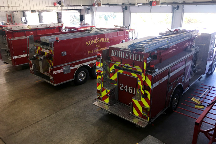 Kohlsville Fire Department Fire Trucks in Apparatus Bay Kohlsville Fire Department fire trucks parked inside the fire station apparatus bay