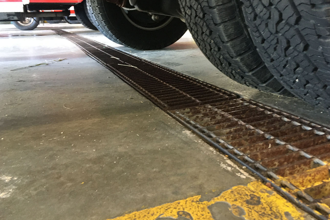 Kohlsville Fire Department apparatus bay floor drain beneath fire truck tires Inline Floor Drains