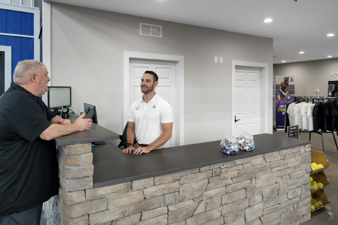 Front desk reception area inside Pickleball Paddock facility built by Walters Buildings