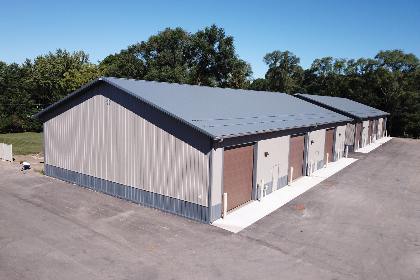 storage condominiums complex with multiple units and overhead doors from aerial view