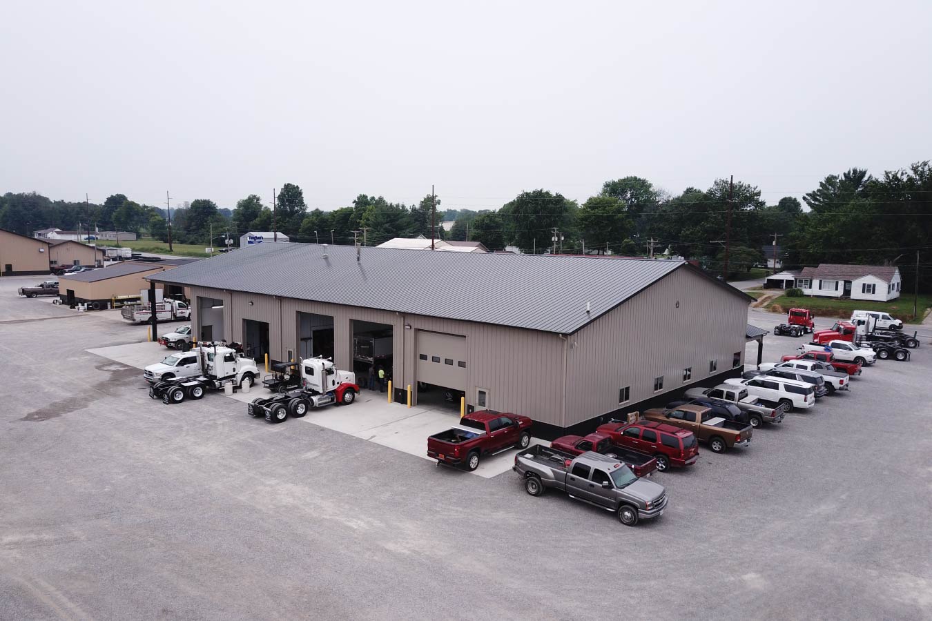 Vaughan Equipment commercial service building with trucks parked outside