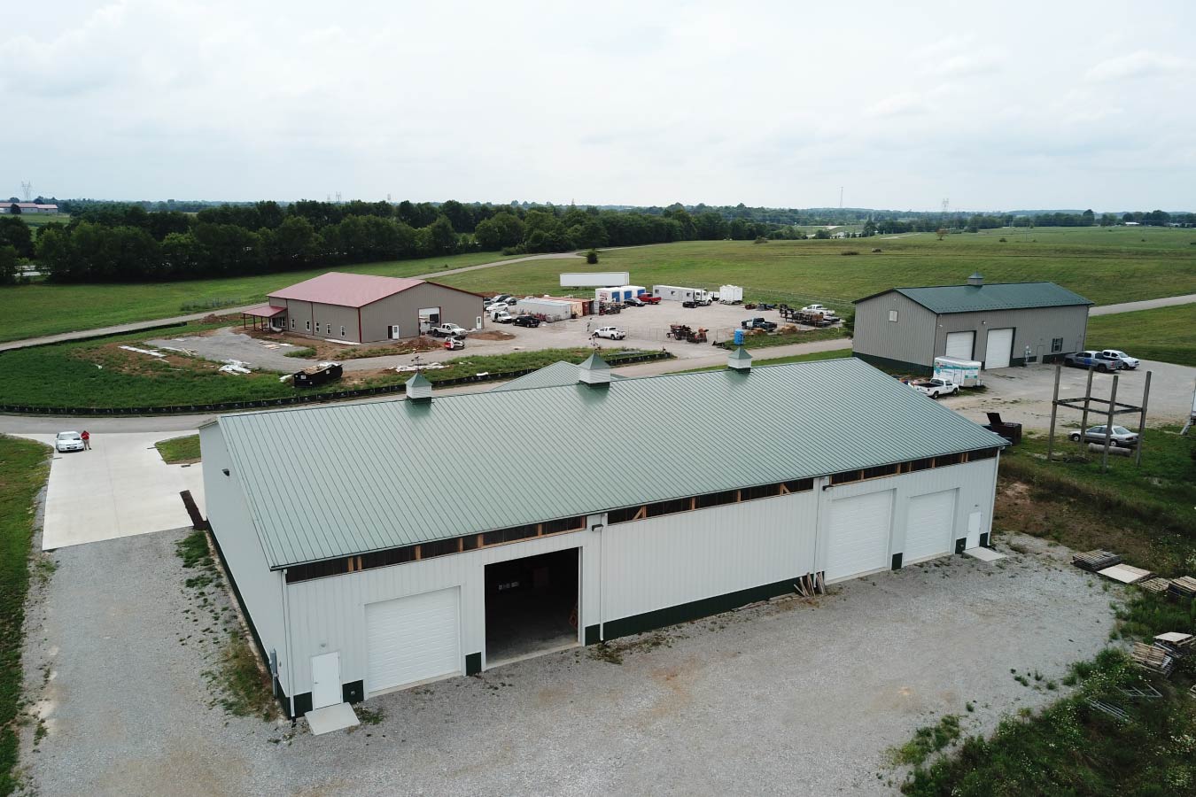 Aerial view of plumbing warehouse with multiple overhead storage doors