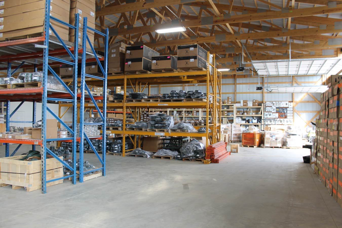 Interior of plumbing warehouse with shelving and plumbing inventory