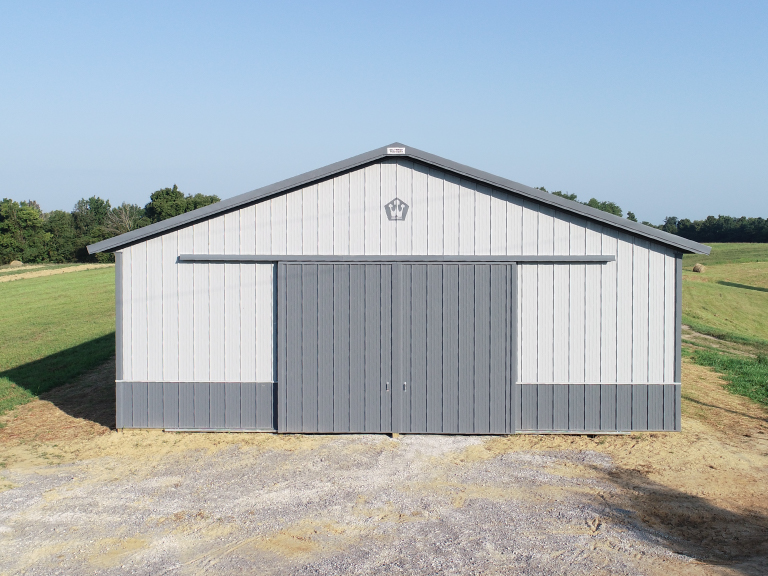Post frame building with steel siding and large sliding door designed with Walters 3D building designer