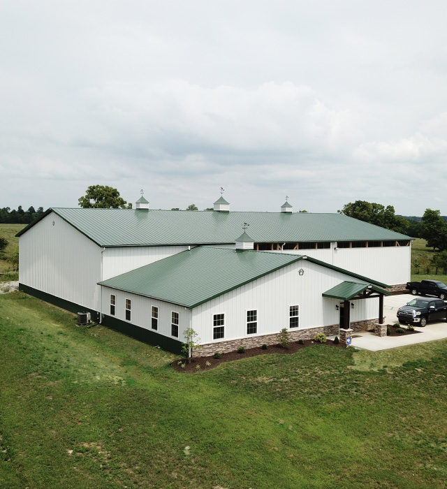 Plumbing Warehouse – Office and Warehouse Exterior in Midway Kentucky Plumbing warehouse building with office entrance and warehouse storage space