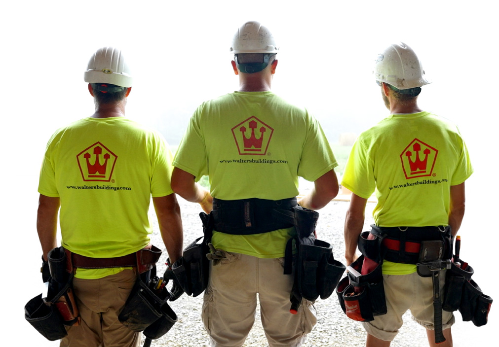 Walters Buildings construction crew wearing branded shirts and safety gear on job site