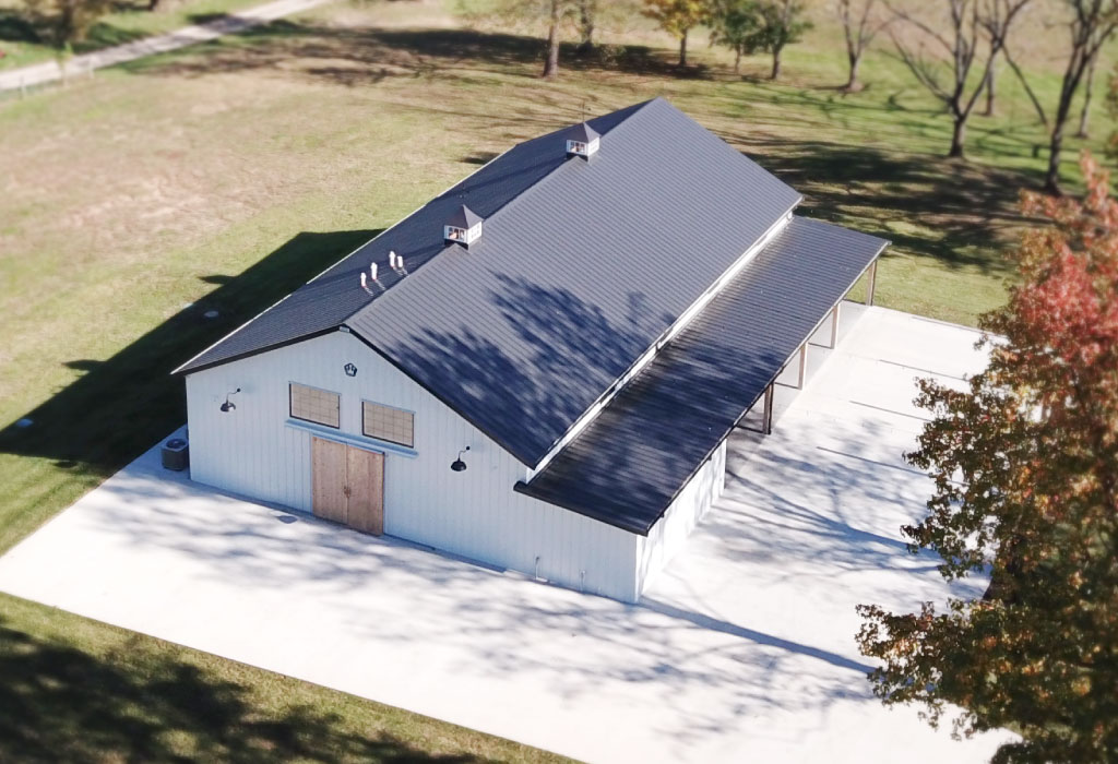 Post Frame Building with Lean To Addition Designed with Walters 3D Building Designer Post frame building with steel siding, sliding door, cupolas, and lean to addition designed with Walters 3D building designer