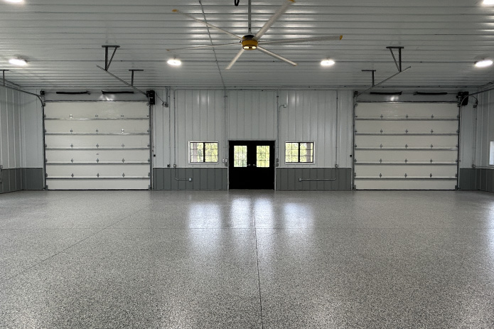 Gable Entrance Building Interior with Epoxy Floor | Walters Buildings Gable entrance building interior with epoxy floor, steel liner panels, and dual overhead doors