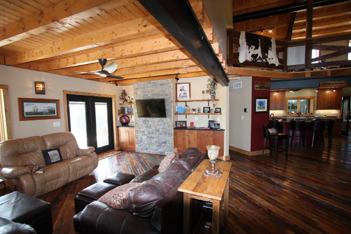 Vaulted ceiling detail with exposed timber trusses and wood paneling