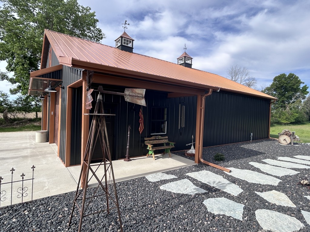 ide Porch on 36×50 Metal Garage 36x50 metal garage with side porch entry, post-frame construction, and custom pole barn garage design by Walters Buildings
