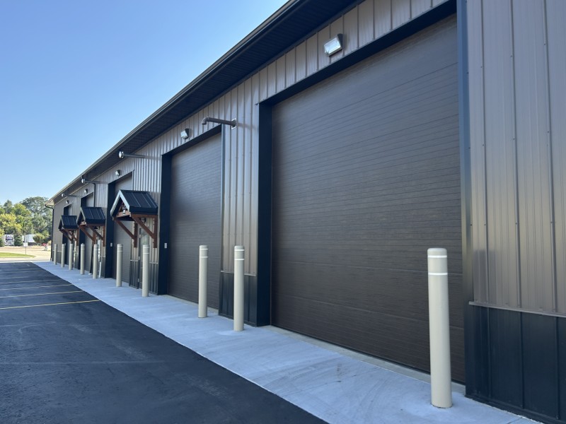 Commercial Flex Space Overhead Doors and Entrances Commercial flex space units with overhead doors, protective bollards and lighted entrances