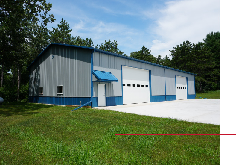 Dual Overhead doors and eyebrow overhang entrance Dual Overhead doors and eyebrow overhang entrance