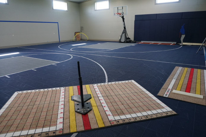 Custom Features Including a Baseball Practice Area and Basketball Court